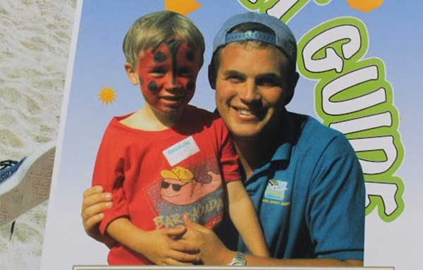 Happy staff and children on the Barracudas Activity Camp brochure
