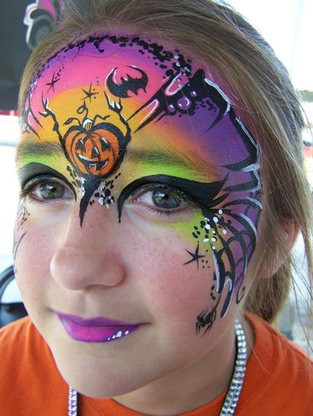 Spooky pumpkin face paint idea for kids